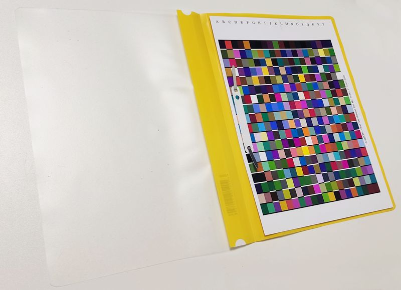 Перфорация дыроколом и подшивка в папку